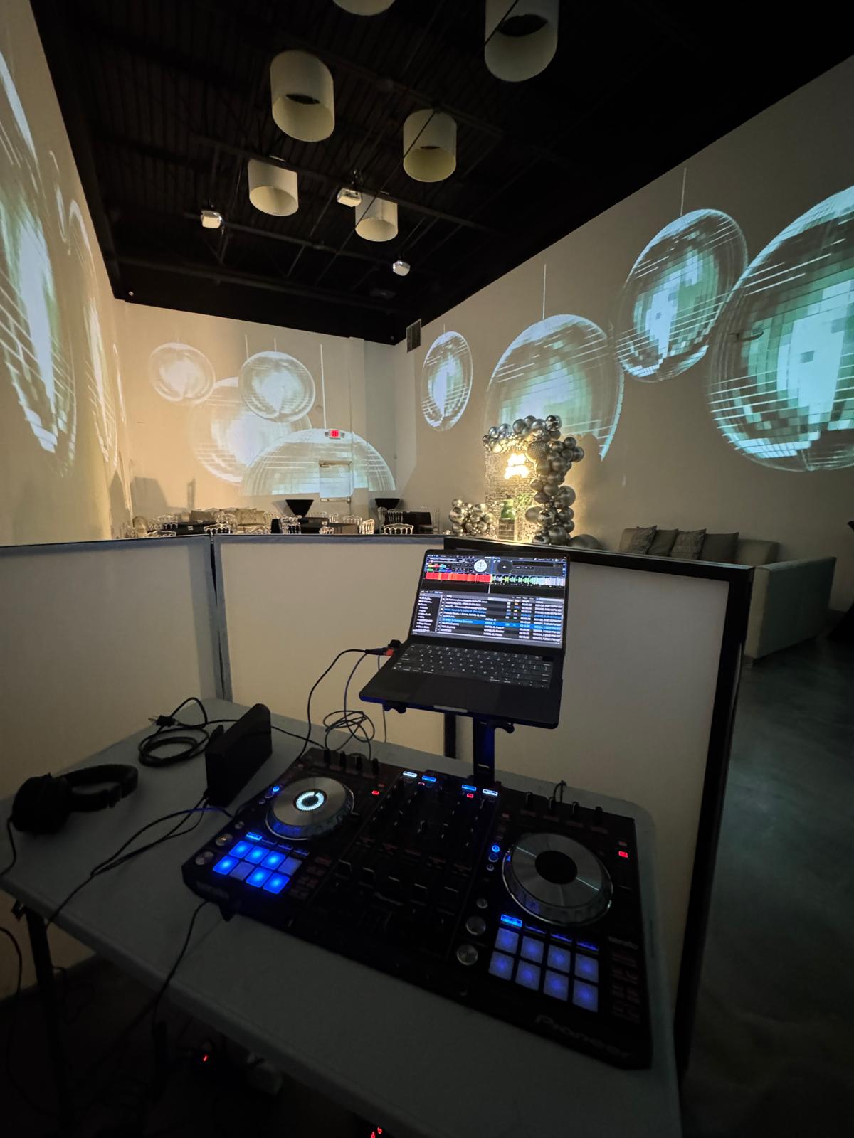 DJ booth and lighting setup